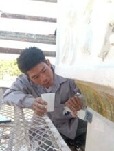 Vansouk Keophan – Peinture finale sur le pinacle – janvier 2026 (© Projet CHAMPA).